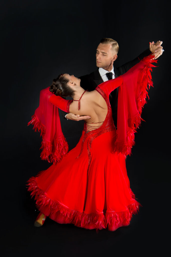 Partners in motion, showcasing their elegance while dancing the Viennese Waltz.