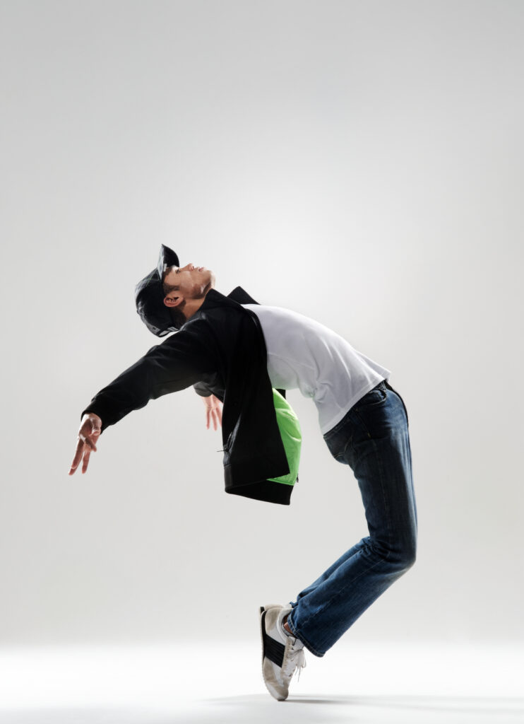Student learning basic moves in their first private dance lesson